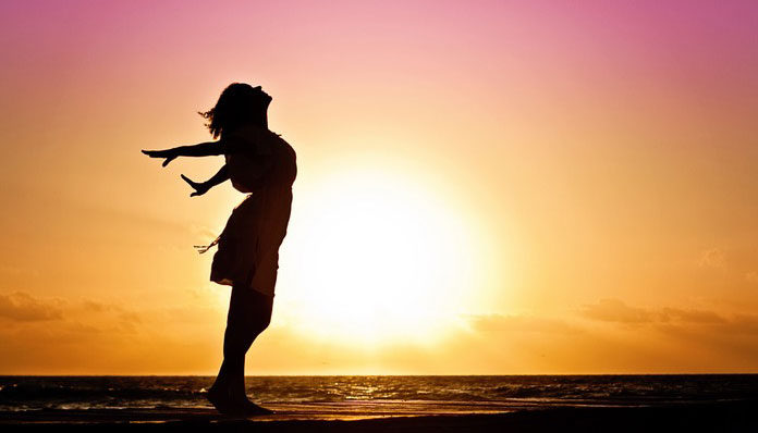 woman-happiness-sunrise-silhouette-40192