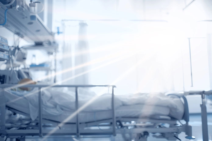 Flash of light illuminating a patient in intensive care, concept