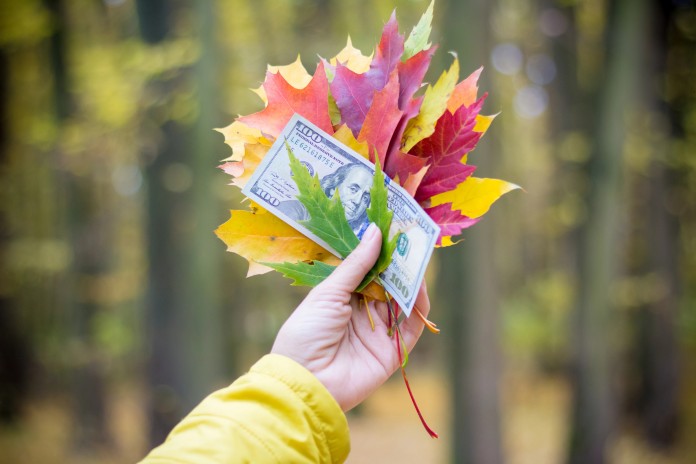 one-hundred-dollars-hand-together-Depositphotos_517035214_XL